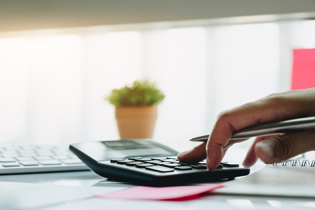 person using calcuator 